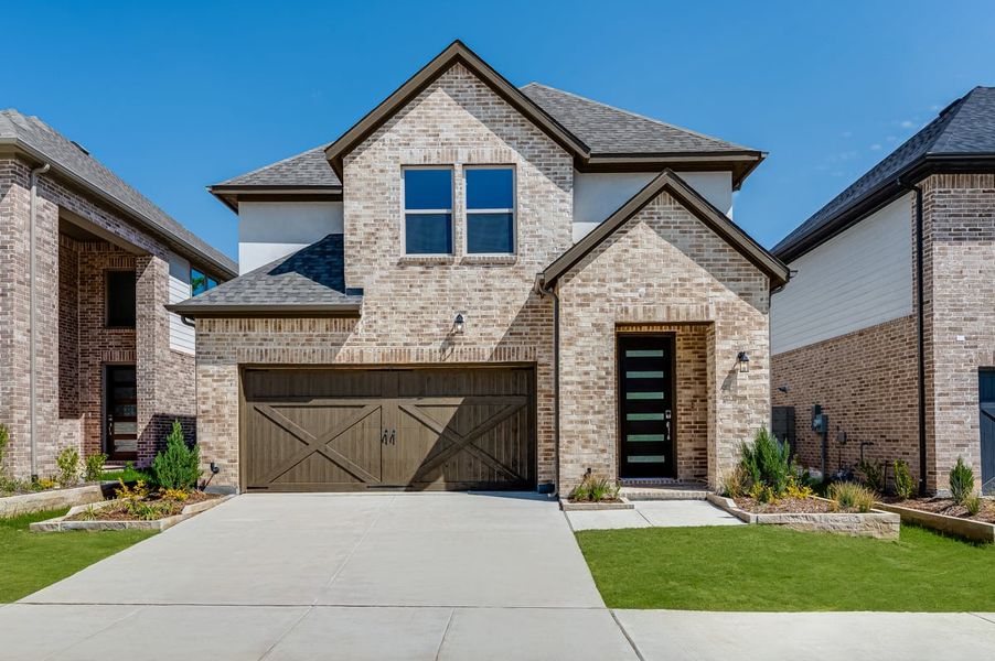 Representative exterior photo of a completed home built from the Chesapeake by Taylor Morrison in The Retreat at Harvest, Argyle, TX (Image 4).