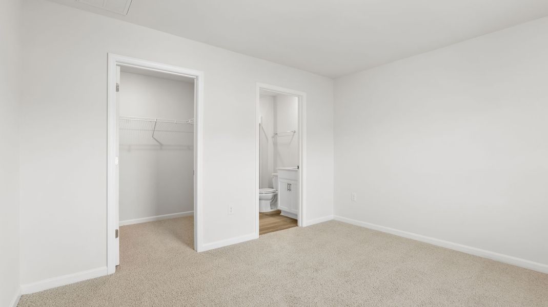 Spacious, unfurnished interior of a new home in Village Grove, Greenville (Image 25).