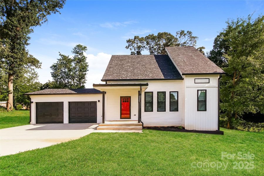 Front exterior of a new home in , Statesville, NC, highlighting curb appeal (Image 2). Front exterior of a new home in , Statesville, NC, highlighting curb appeal (Image 2).