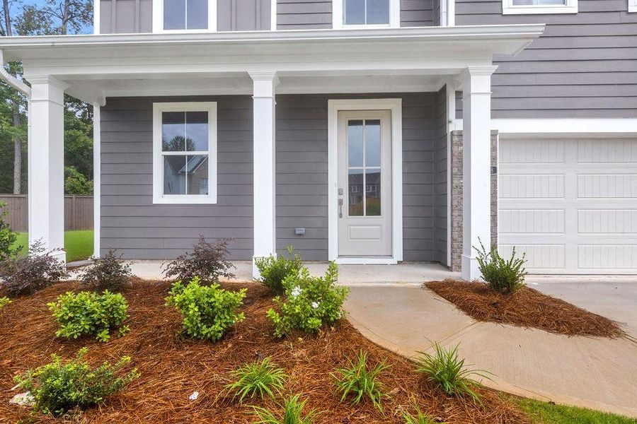 Exterior details and patio area of a home in Maddox Landing, Hoschton (Image 4).