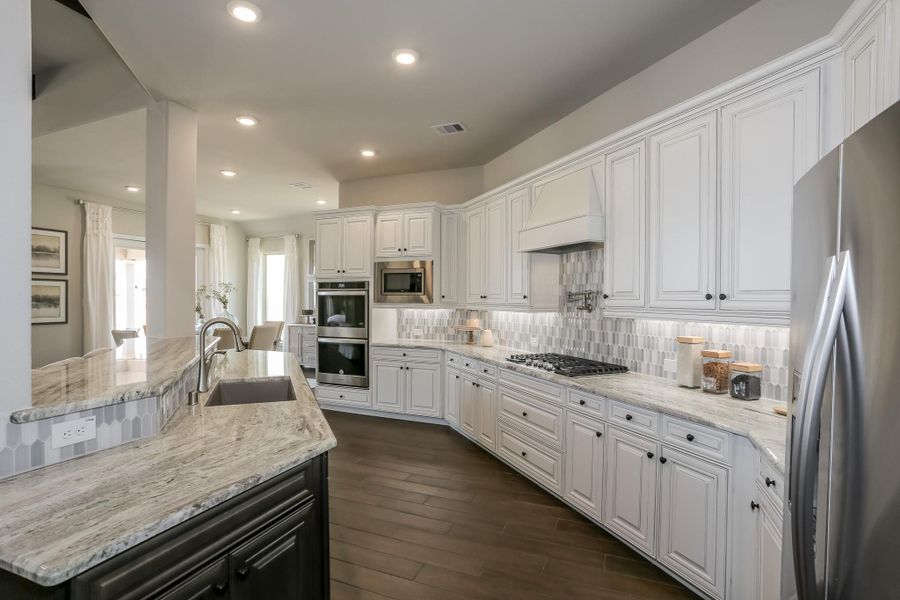 Furnished interior view inside a new home in Valencia: Hilltop Collection, Manvel (Image 11).