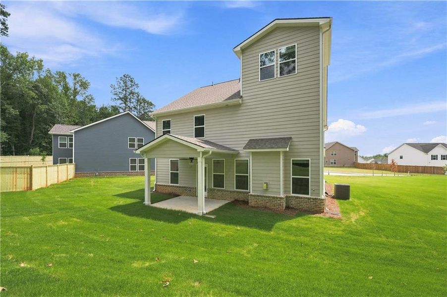 Exterior details and patio area of a home in Cooper Park, McDonough (Image 4).
