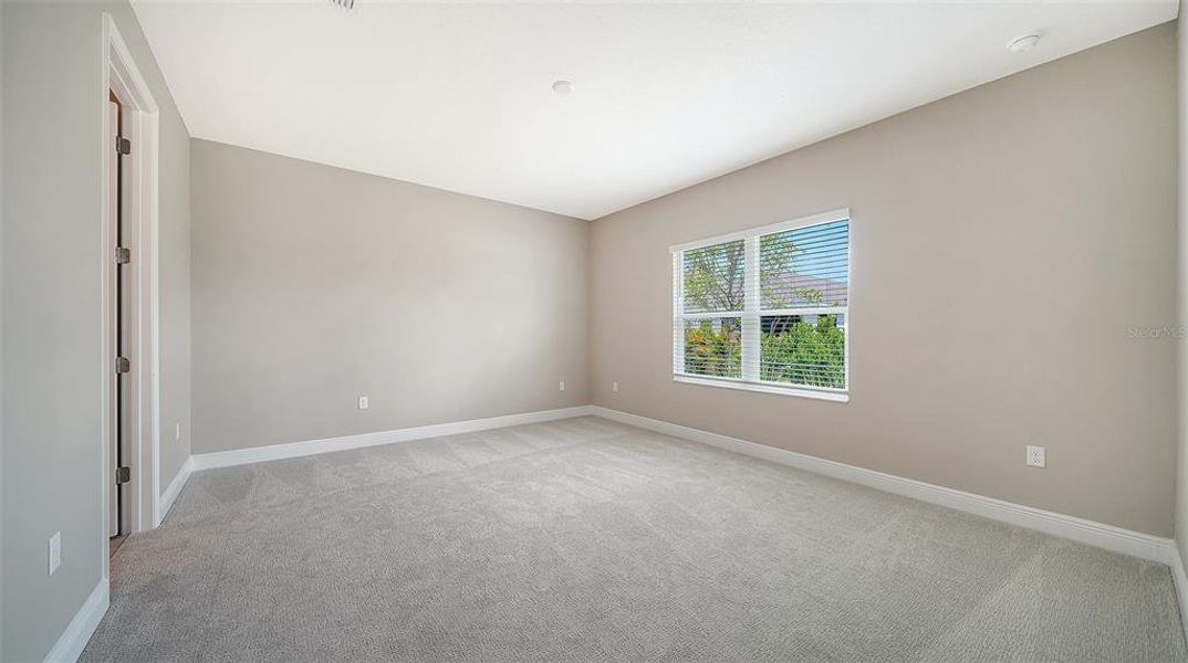 Spacious, unfurnished interior of a new home in Wildleaf at North River Ranch, Parrish (Image 18).
