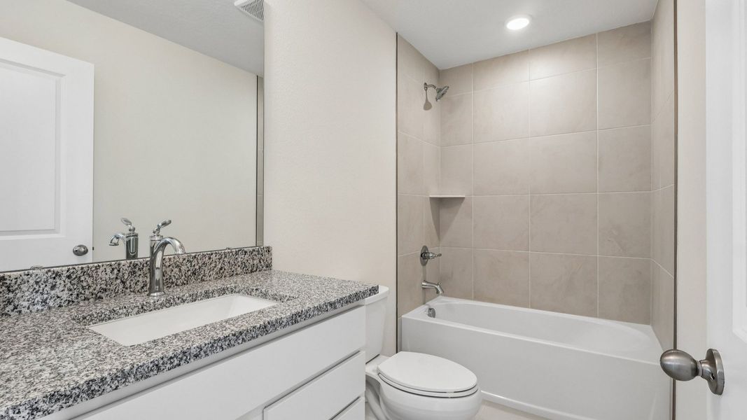 Furnished interior view inside a new home in Cyrene at Harmony, St. Cloud (Image 35).
