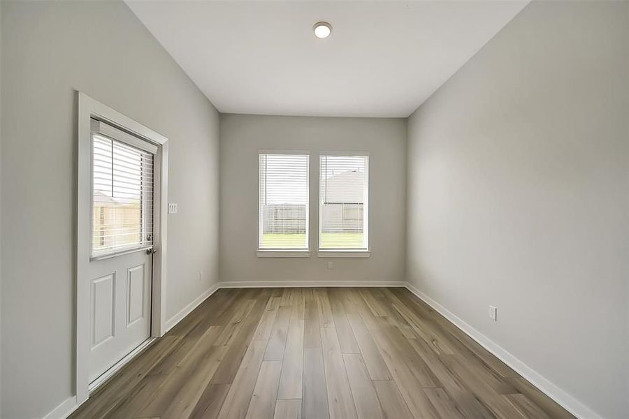 Spacious, unfurnished interior of a new home in Sunterra, Katy (Image 30).