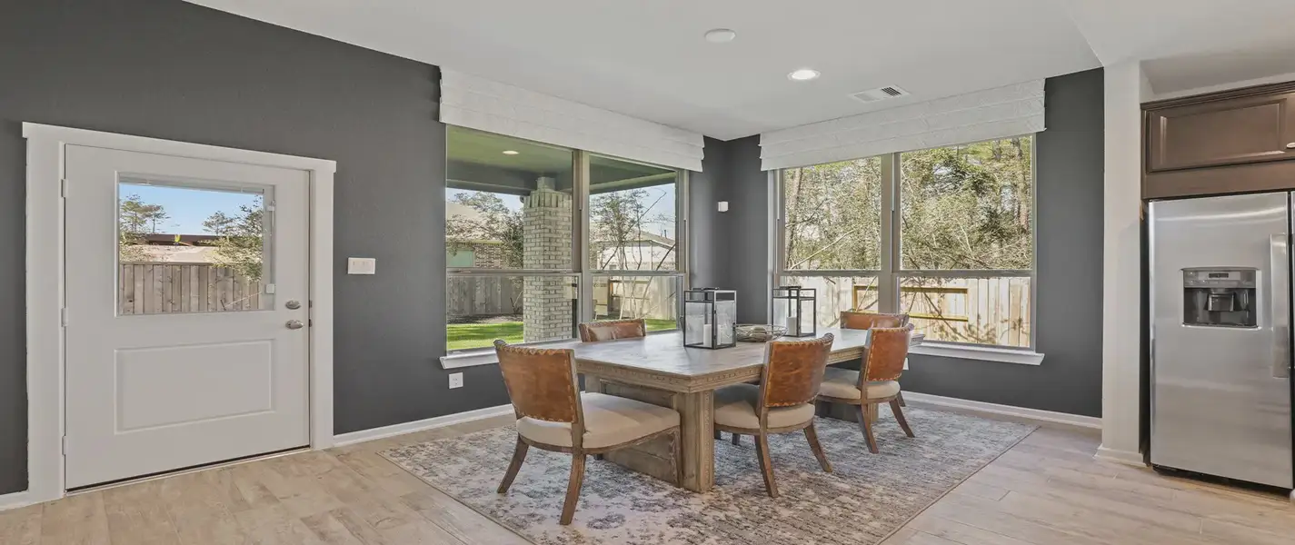 Representative furnished interior of a home built from the Durham by Chesmar Homes in The Woodlands Hills, Willis (Image 8).
