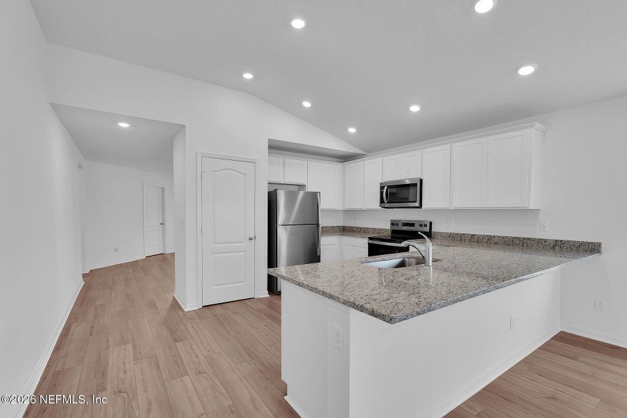 Furnished interior view inside a new home in Westport Landing, Jacksonville (Image 9).