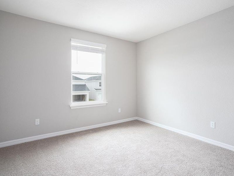 Secondary bedrooms provide space for everyone in your household - Brynn bungalow by Highland Homes