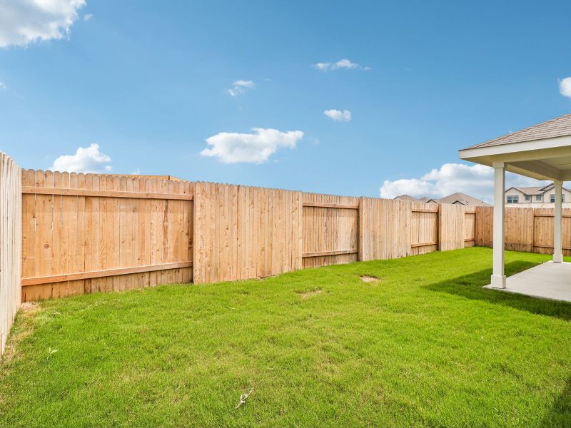 Exterior details and patio area of a home in Riverbend at Double Eagle - Reserve Collection, Cedar Creek (Image 3).