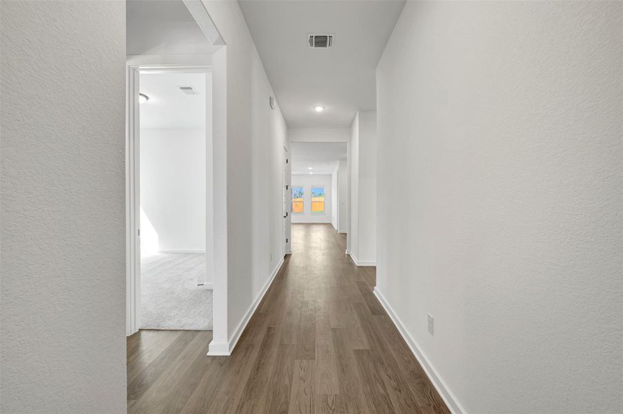 Spacious, unfurnished interior of a new home in Heritage, Dripping Springs (Image 24).