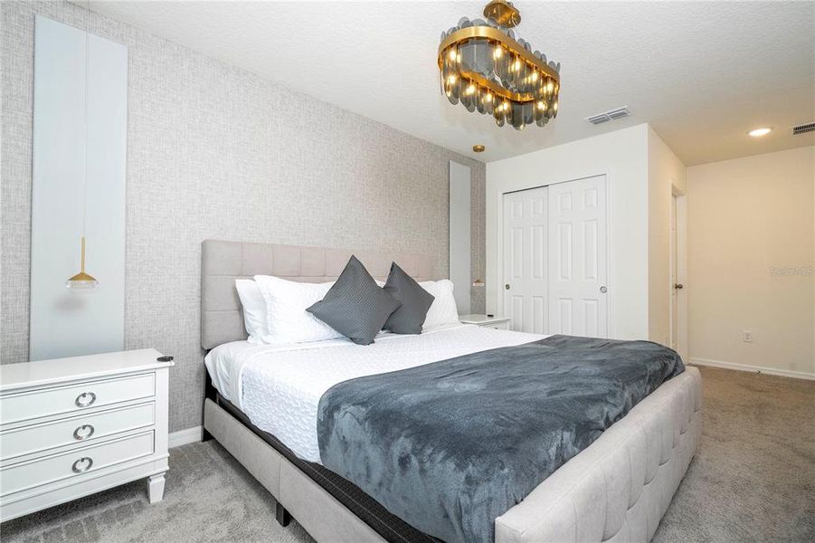 Furnished interior view inside a new home in Solara Resort, Kissimmee (Image 10).