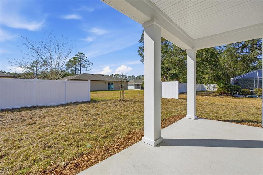 Exterior details and patio area of a home in Palm Coast Homes, Palm Coast (Image 22).