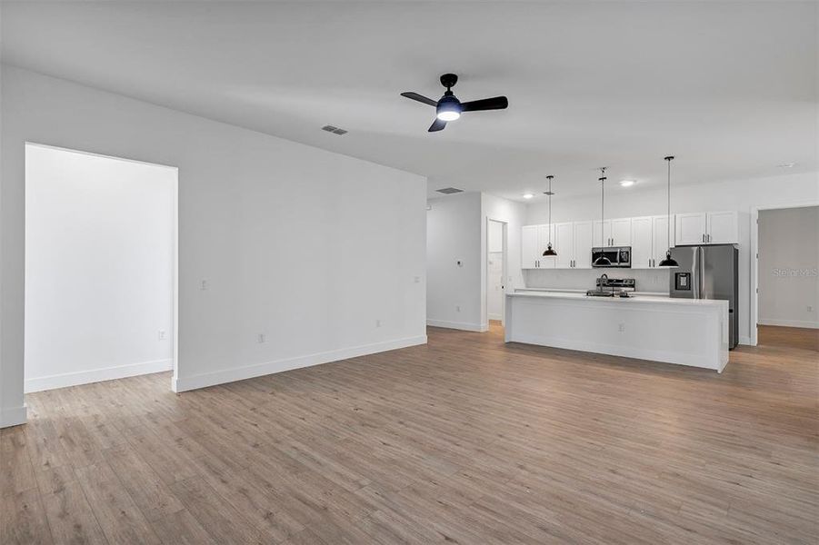 Spacious, unfurnished interior of a new home in , Port Charlotte (Image 24).