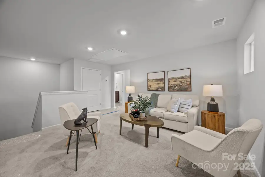 Furnished interior view inside a new home in McFarland Estates, York (Image 7).