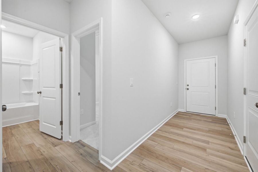 Spacious, unfurnished interior of a new home in Carpenter Falls, Durham (Image 50).