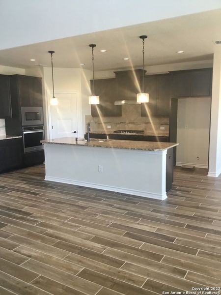 Spacious, unfurnished interior of a new home in West Pointe Gardens, San Antonio (Image 12).