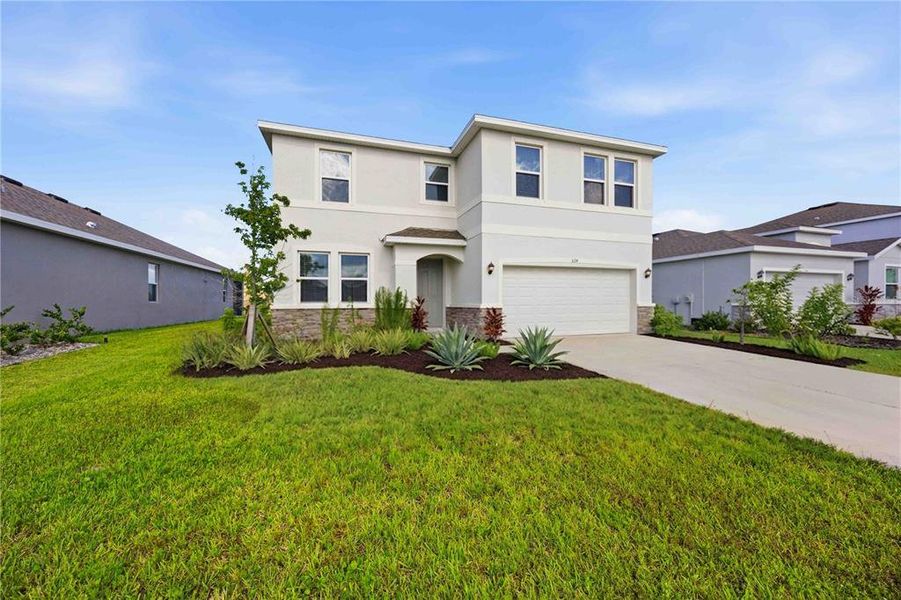 Front exterior of a new home in Coddington, Bradenton, FL, highlighting curb appeal (Image 23).