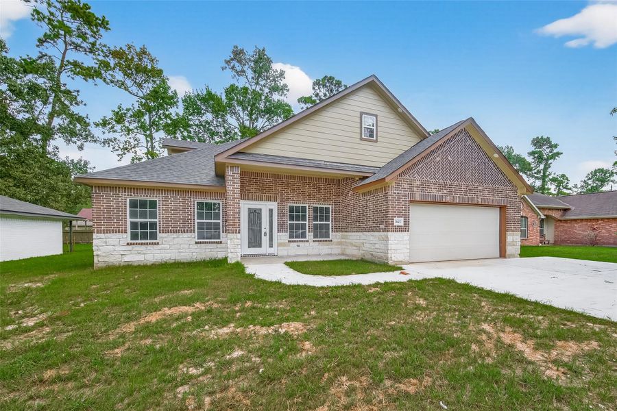 Front exterior of a new home in , Crosby, TX, highlighting curb appeal (Image 1).