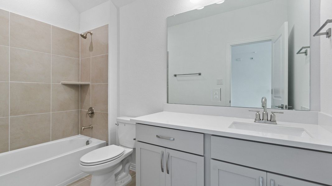 Representative furnished interior of a home built from the Maui by Brightland Homes in Bridgeland Creekland Village, Cypress (Image 11).