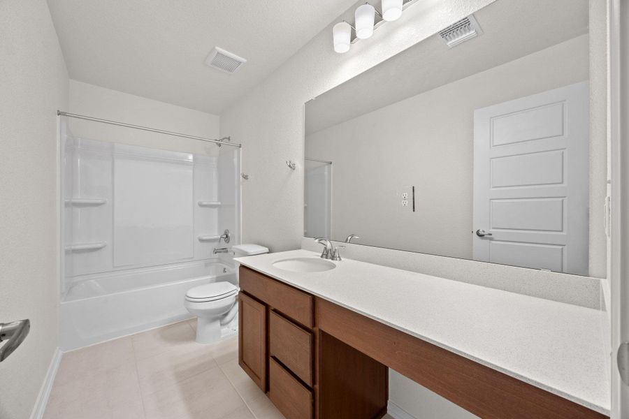 Furnished interior view inside a new home in Creekside at Estancia, Austin (Image 11).