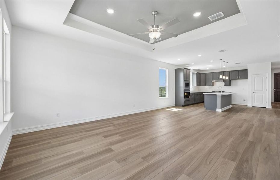 Spacious gathering room with tray ceiling Spacious gathering room with tray ceiling