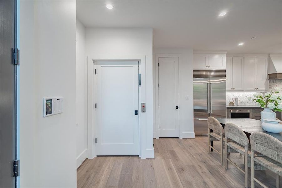 Bedroom with light hardwood / wood-style floors