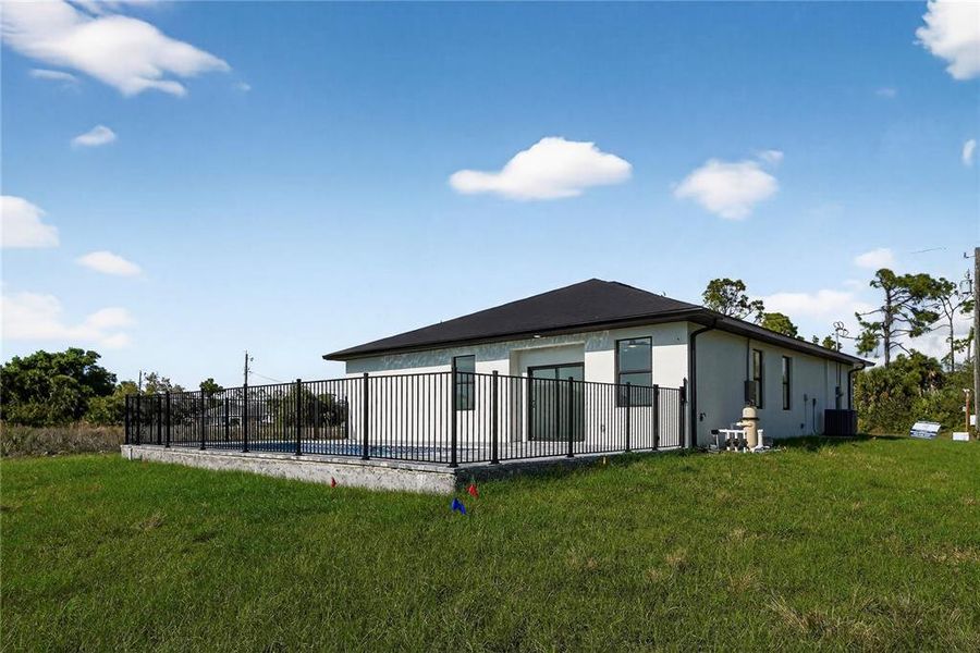 Exterior details and patio area of a home in , Rotonda West (Image 30).