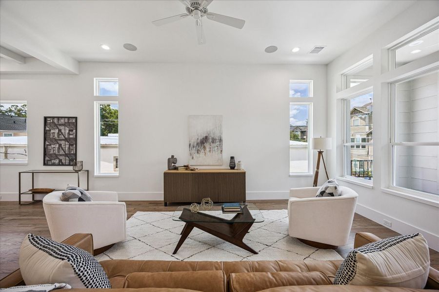 Soaring ceilings, oversized windows and an abundance of natural light throughout.