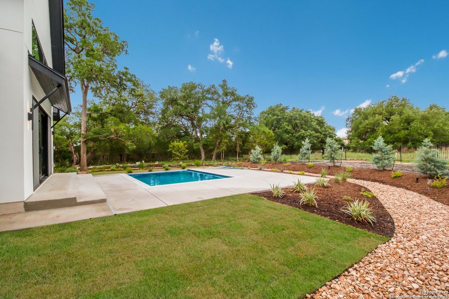 Front exterior of a new home in , Spring Branch, TX, highlighting curb appeal (Image 21). Front exterior of a new home in , Spring Branch, TX, highlighting curb appeal (Image 21).