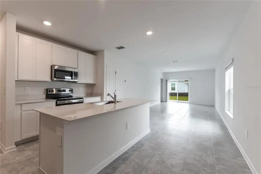 Furnished interior view inside a new home in , Davenport (Image 6).