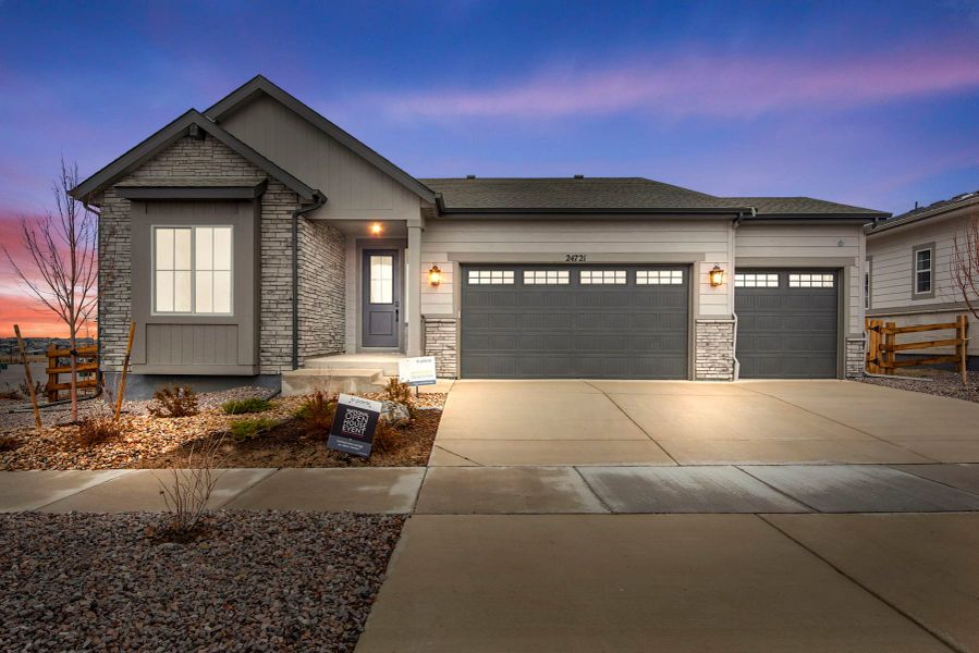 Front exterior of a new home in The Aurora Highlands, Aurora, CO, highlighting curb appeal (Image 1). Front exterior of a new home in The Aurora Highlands, Aurora, CO, highlighting curb appeal (Image 1).