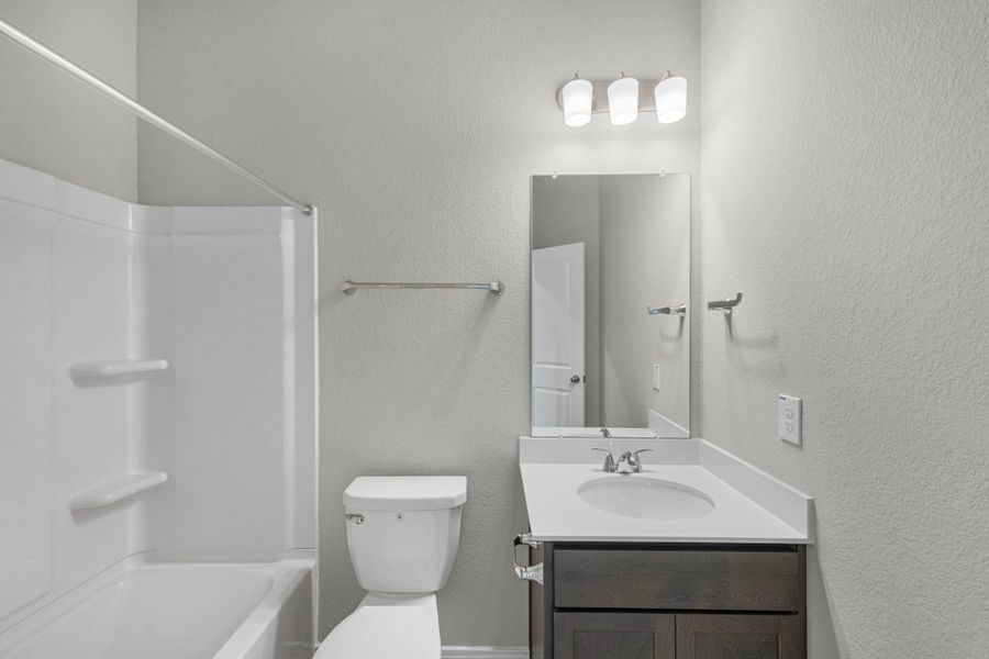 A useful full/guest bathroom.