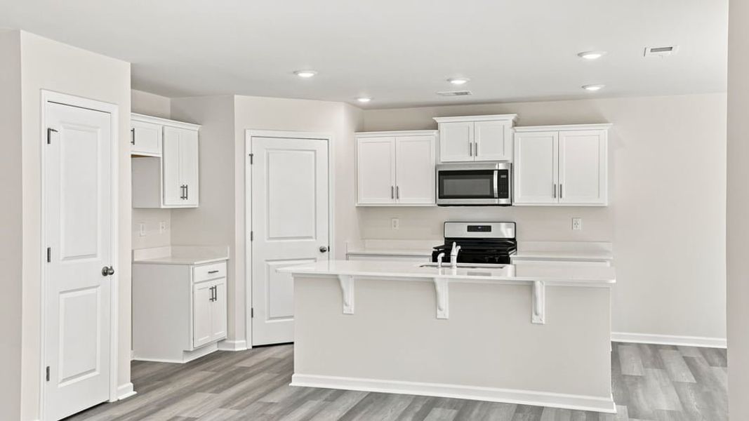 Furnished interior view inside a new home in Harrier Point, Woodruff (Image 6).