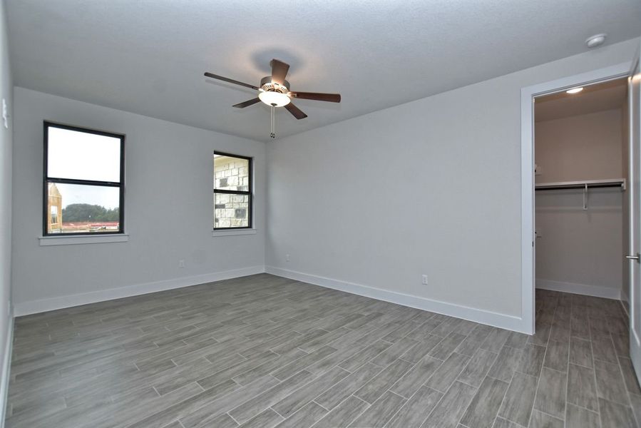 Representative unfurnished interior of a home built from the Avalon by Giddens Homes in Scofield Farms Estates, Georgetown (Image 135).