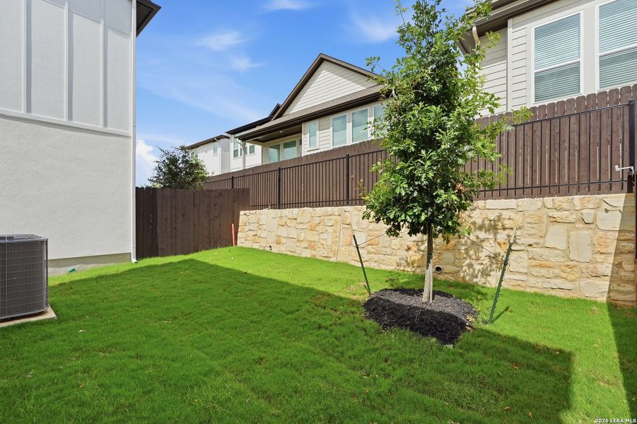 Exterior details and patio area of a home in Centero at Stone Oak, San Antonio (Image 27). Exterior details and patio area of a home in Centero at Stone Oak, San Antonio (Image 27).