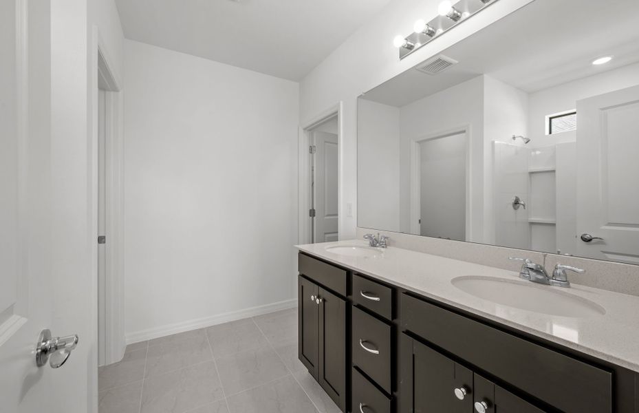 Furnished interior view inside a new home in Whispering Lakes, Lehigh Acres (Image 8).
