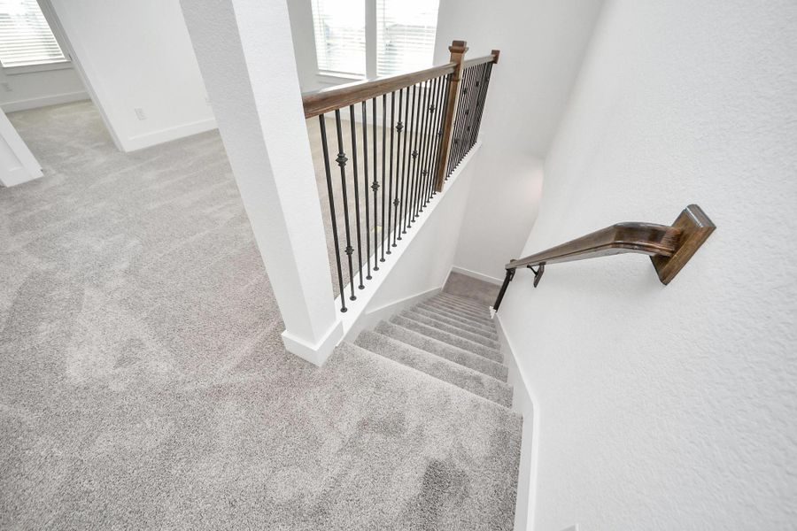 Spacious, unfurnished interior of a new home in Sunterra: Landmark Collection, Katy (Image 5).