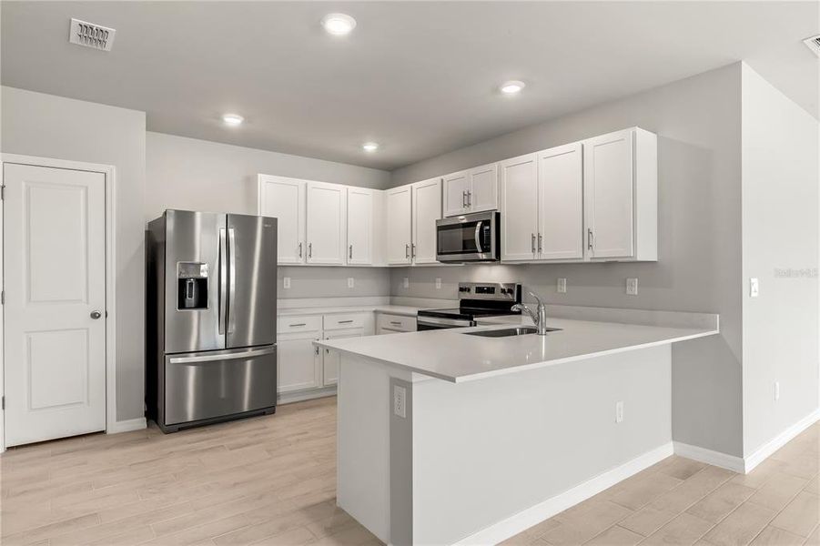 Furnished interior view inside a new home in Sea Cove, Punta Gorda (Image 5). Furnished interior view inside a new home in Sea Cove, Punta Gorda (Image 5).