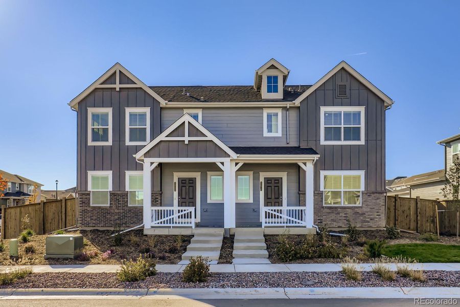 Front exterior of a new home in , Thornton, CO, highlighting curb appeal (Image 1). Front exterior of a new home in , Thornton, CO, highlighting curb appeal (Image 1).