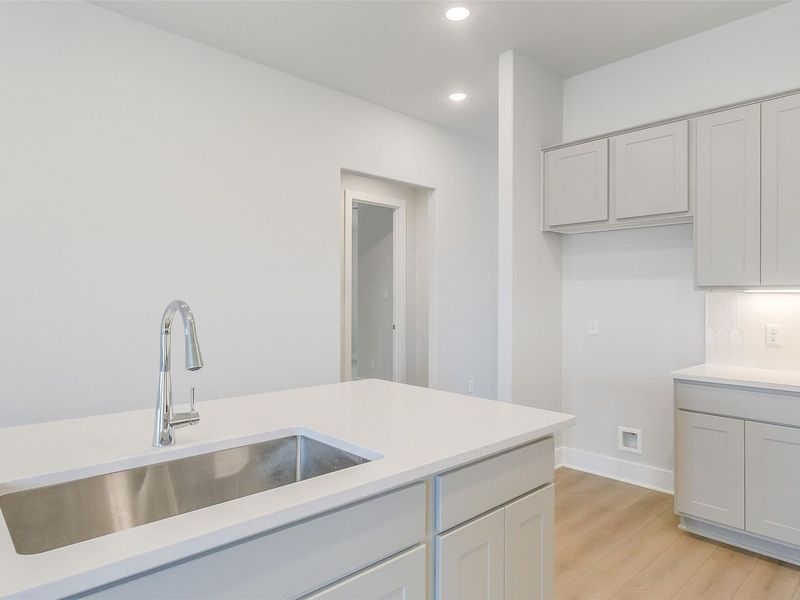 Close-up of interior finishes inside a home in Sunterra, Katy (Image 15).