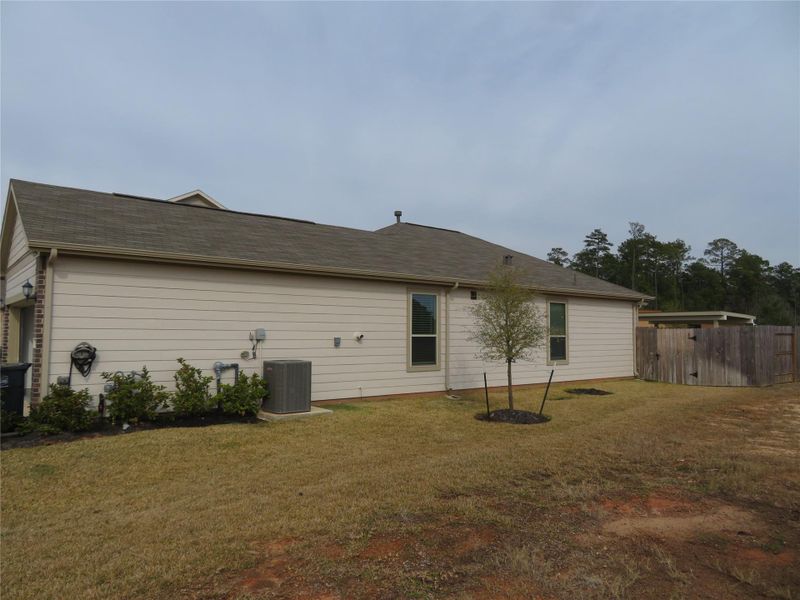 Exterior details and patio area of a home in Sagecrest Trails, Conroe (Image 28). Exterior details and patio area of a home in Sagecrest Trails, Conroe (Image 28).
