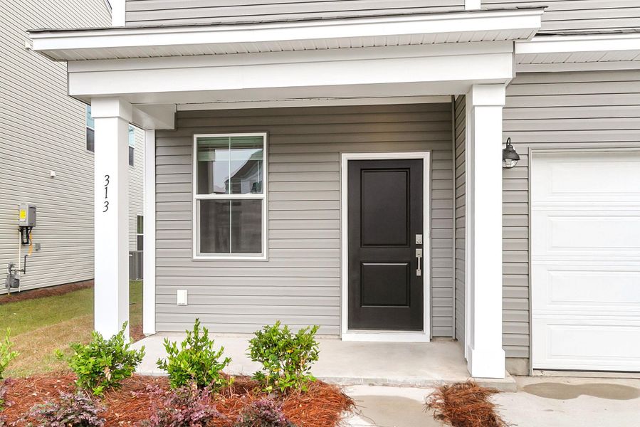 Exterior details and patio area of a home in Wildcat Chase, Summerville (Image 3).