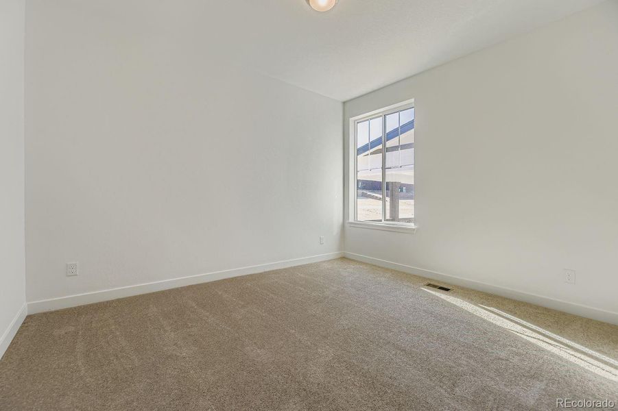 Spacious, unfurnished interior of a new home in Newlin Crossing: The Monarch Collection, Parker (Image 13). Spacious, unfurnished interior of a new home in Newlin Crossing: The Monarch Collection, Parker (Image 13).