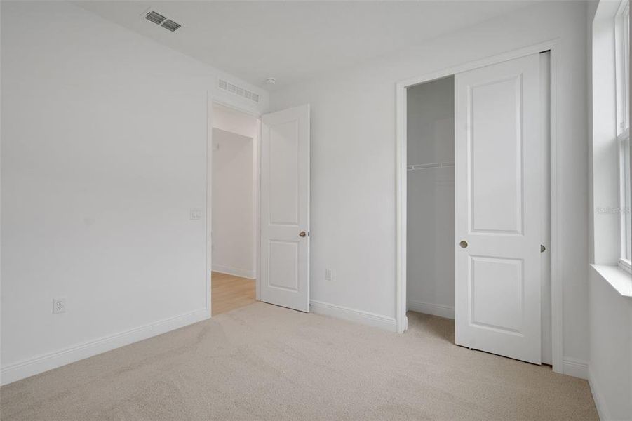 Spacious, unfurnished interior of a new home in Reserve at Hammock Oaks, Lady Lake (Image 23). Spacious, unfurnished interior of a new home in Reserve at Hammock Oaks, Lady Lake (Image 23).
