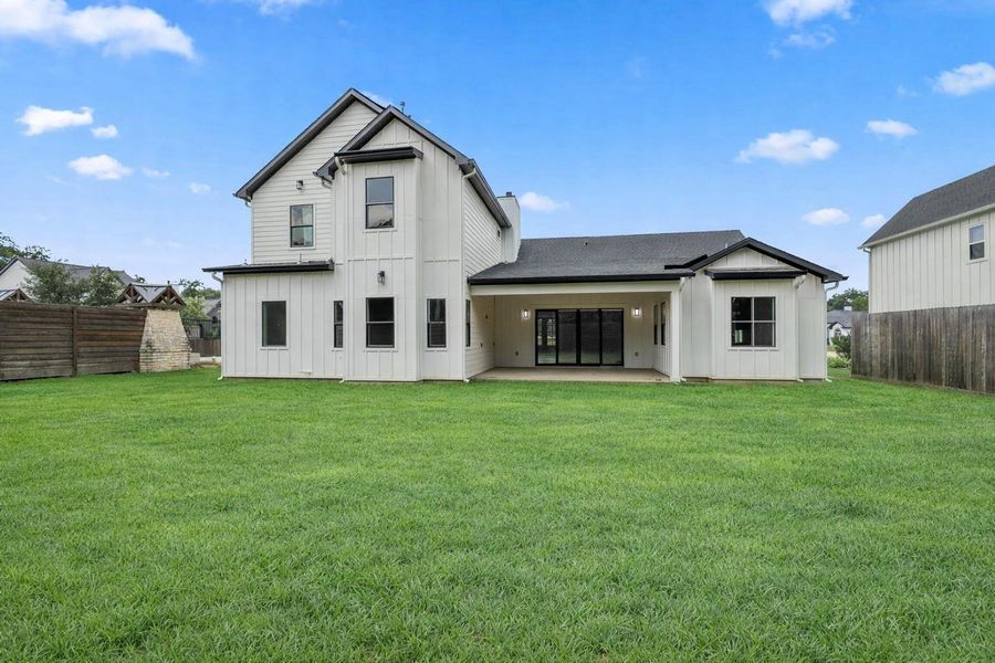Exterior details and patio area of a home in , Tomball (Image 3).