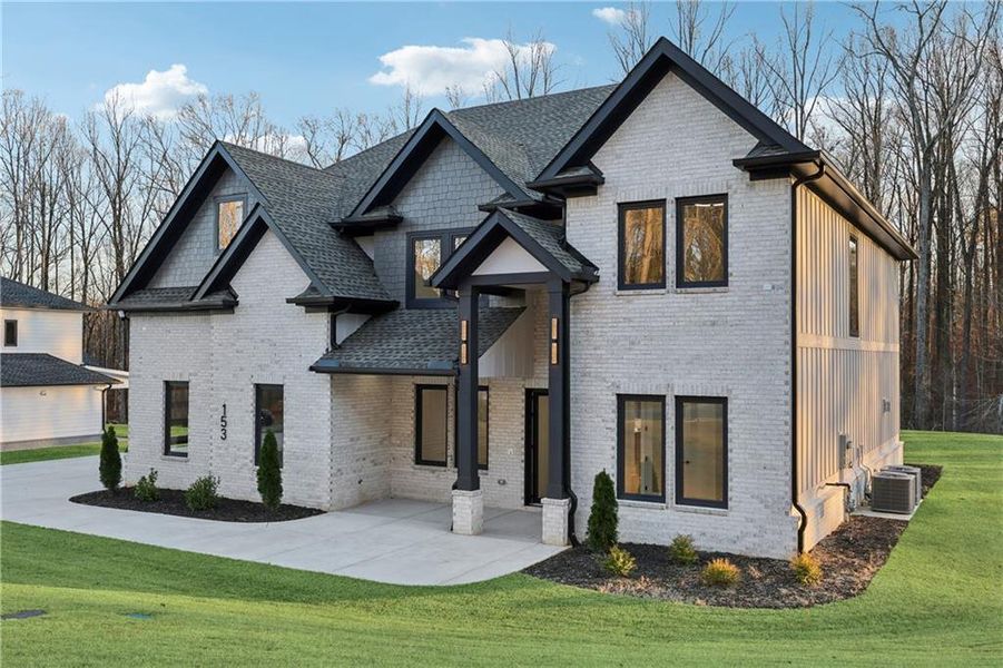 Front exterior of a new home in , Auburn, GA, highlighting curb appeal (Image 30).