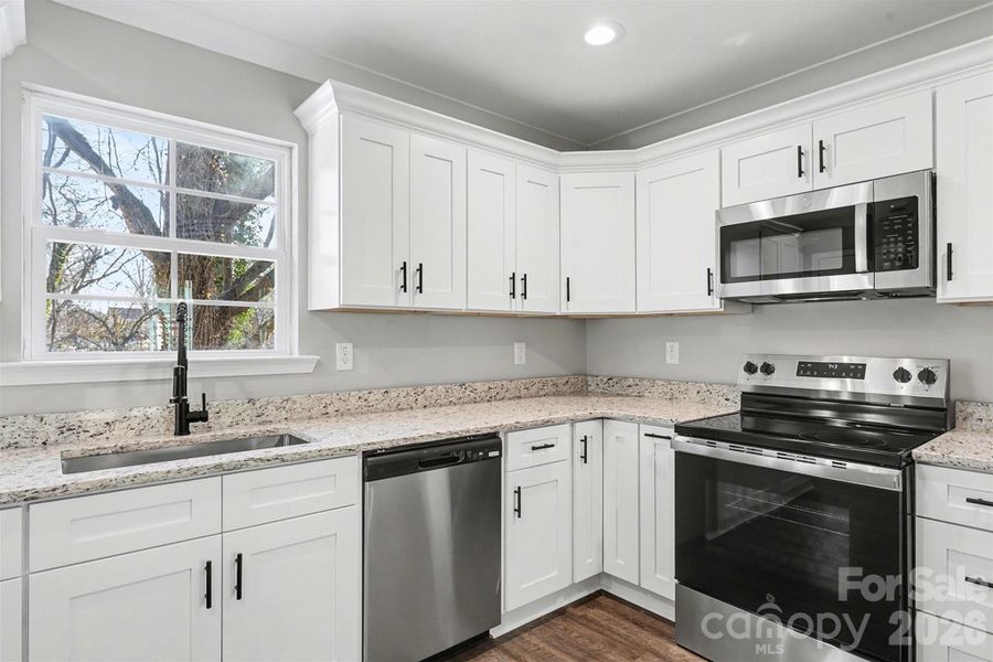 Furnished interior view inside a new home in , High Point (Image 4).