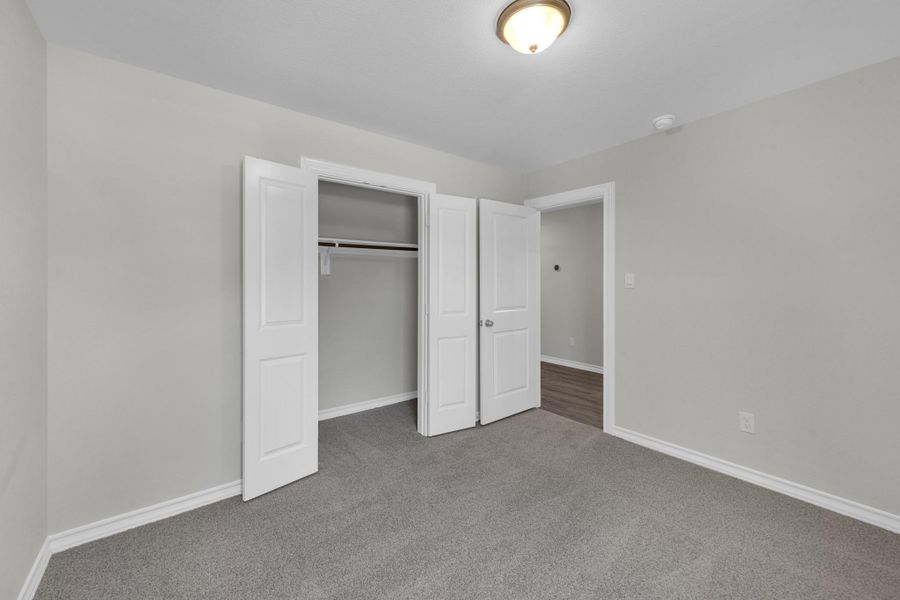 Spacious, unfurnished interior of a new home in The Enclave at Spring Branch, Conroe (Image 27).