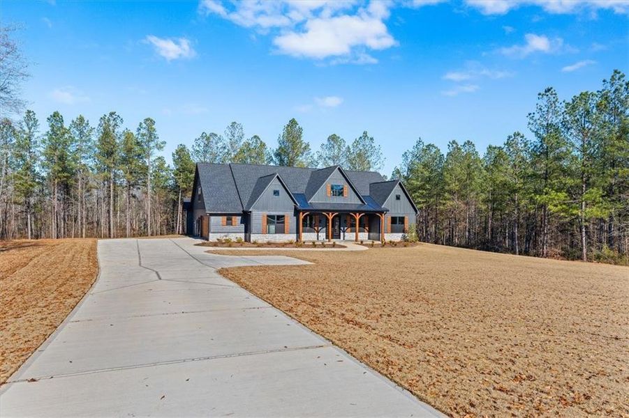 Front exterior of a new home in , Bremen, GA, highlighting curb appeal (Image 25). Front exterior of a new home in , Bremen, GA, highlighting curb appeal (Image 25).