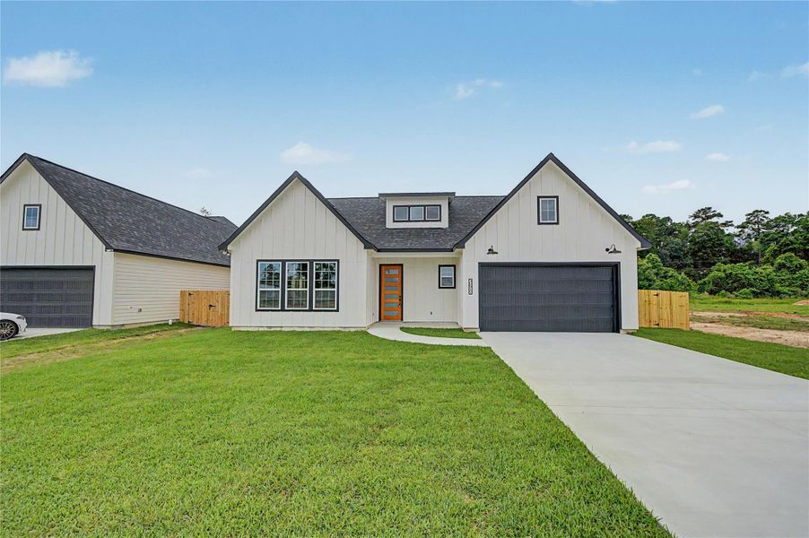 Beautiful new construction home with modern farmhouse-inspired exterior, attached garage, and welcoming front entry.